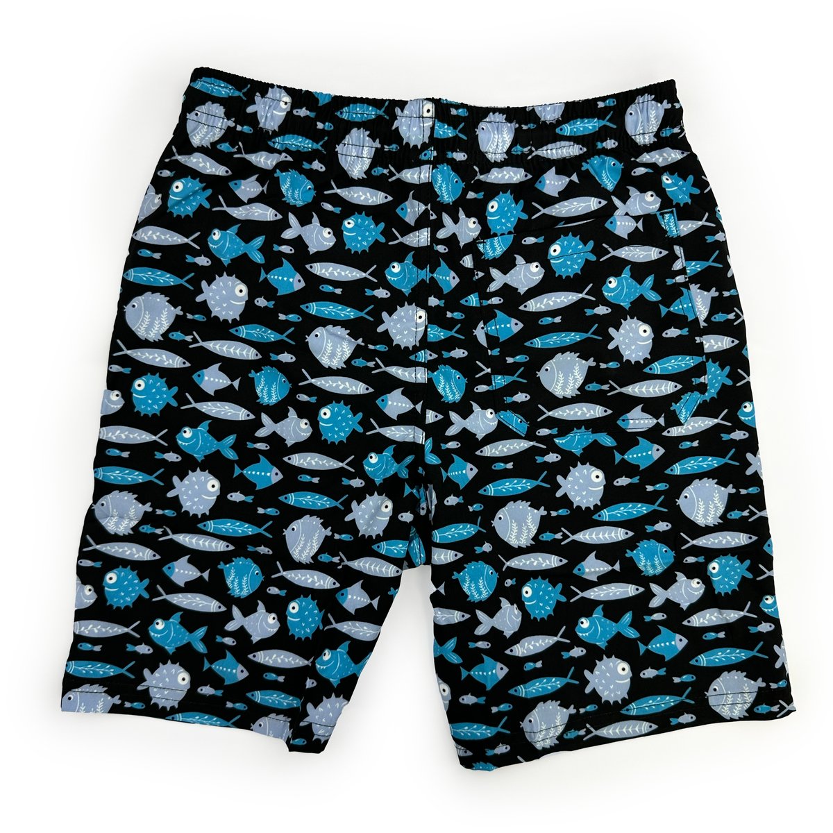 Full back view of men's black swim trunks with blue fish pattern and back pocket