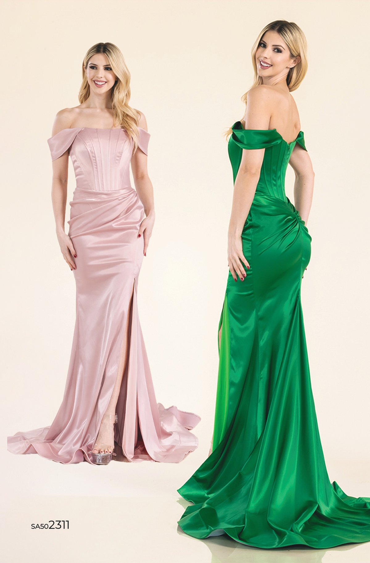 Model wearing a black off-the-shoulder corset satin evening dress with high leg slit and extended train in minimalist studio setting.